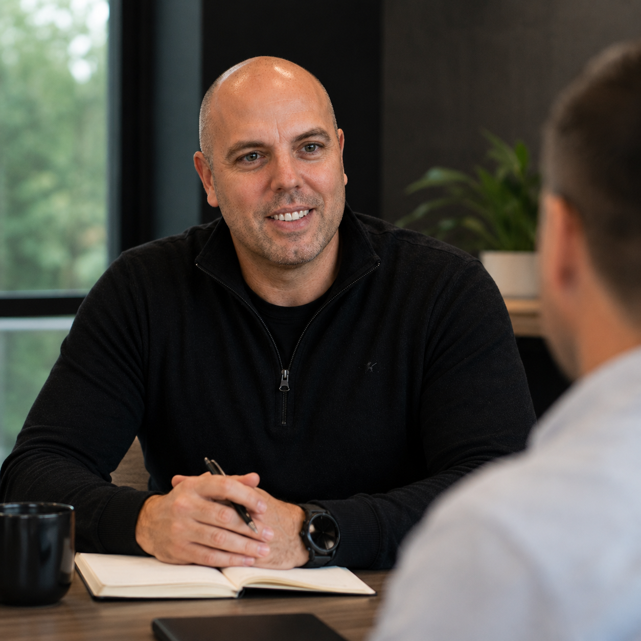 Adam Bonner in a meeting